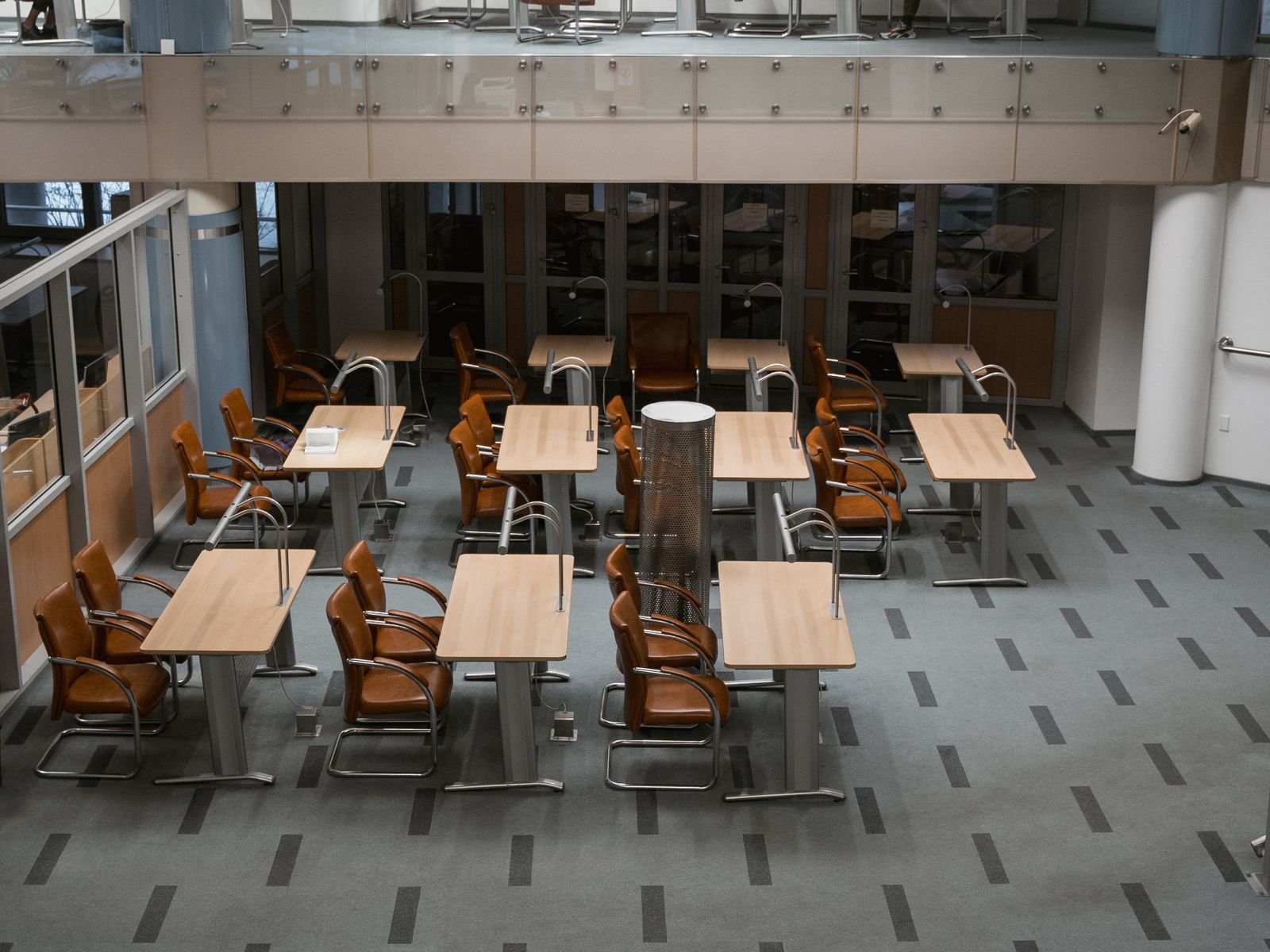 Bright commercial interior with seating, freshly refurbished